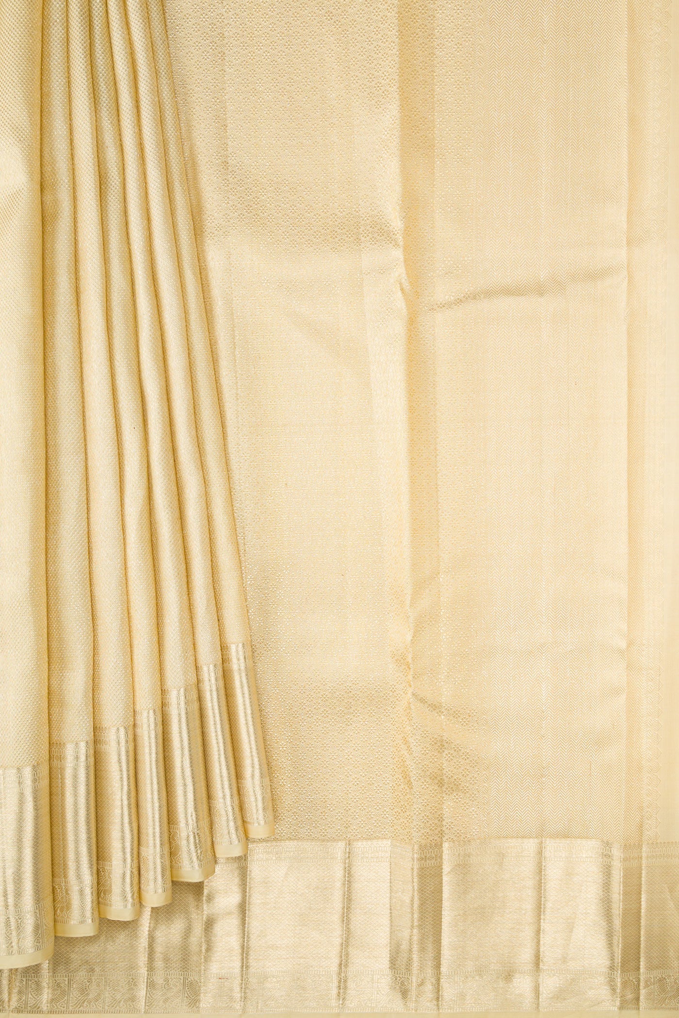 Pleats and pallu of Sandal Dual Tone Kanchipuram Silk Saree with Zari Brocade on the body and Zari Border. 