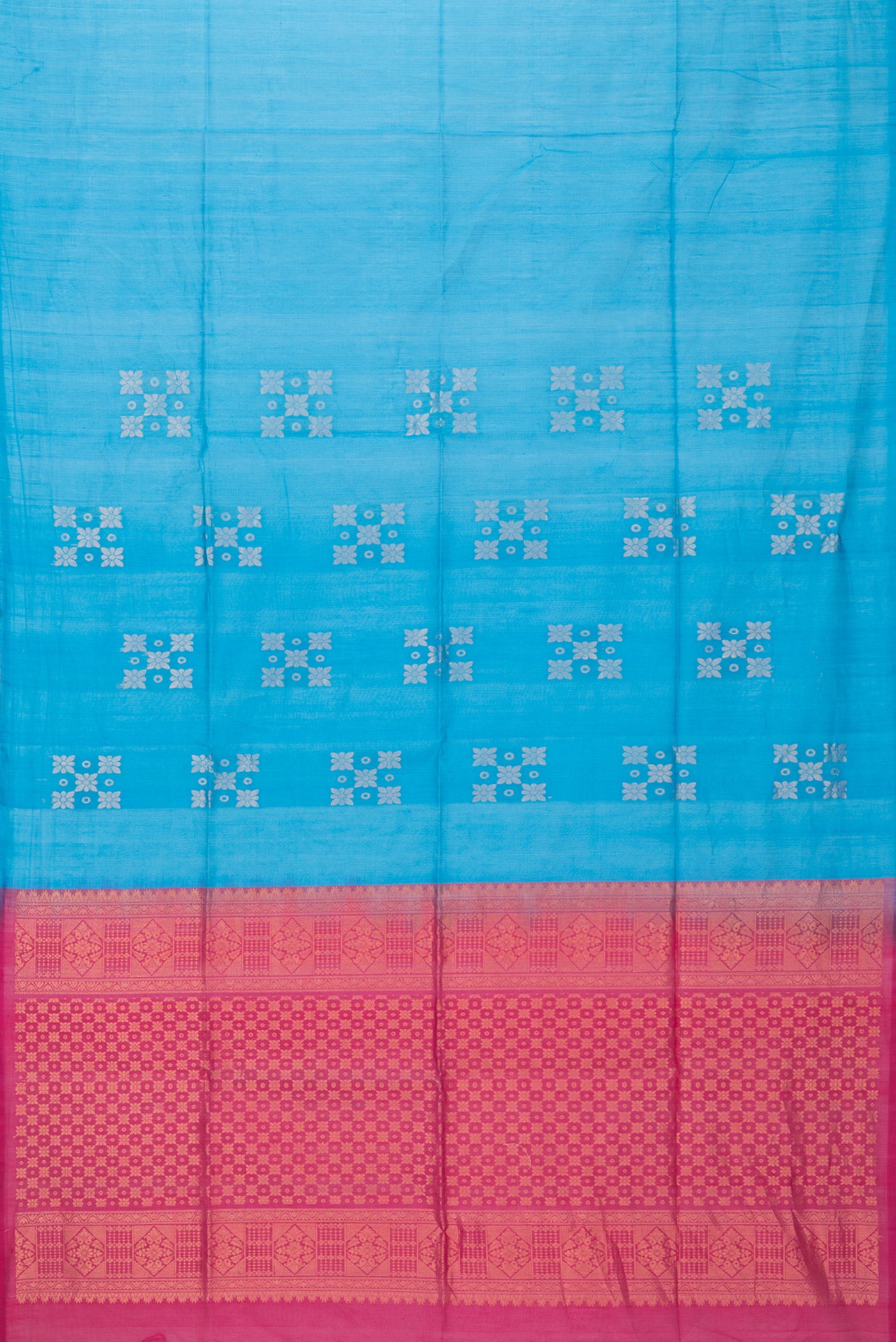 Flat view of Sky Blue Dual Tone Silk Cotton Saree with Zari Butta on the body and Without Border. 