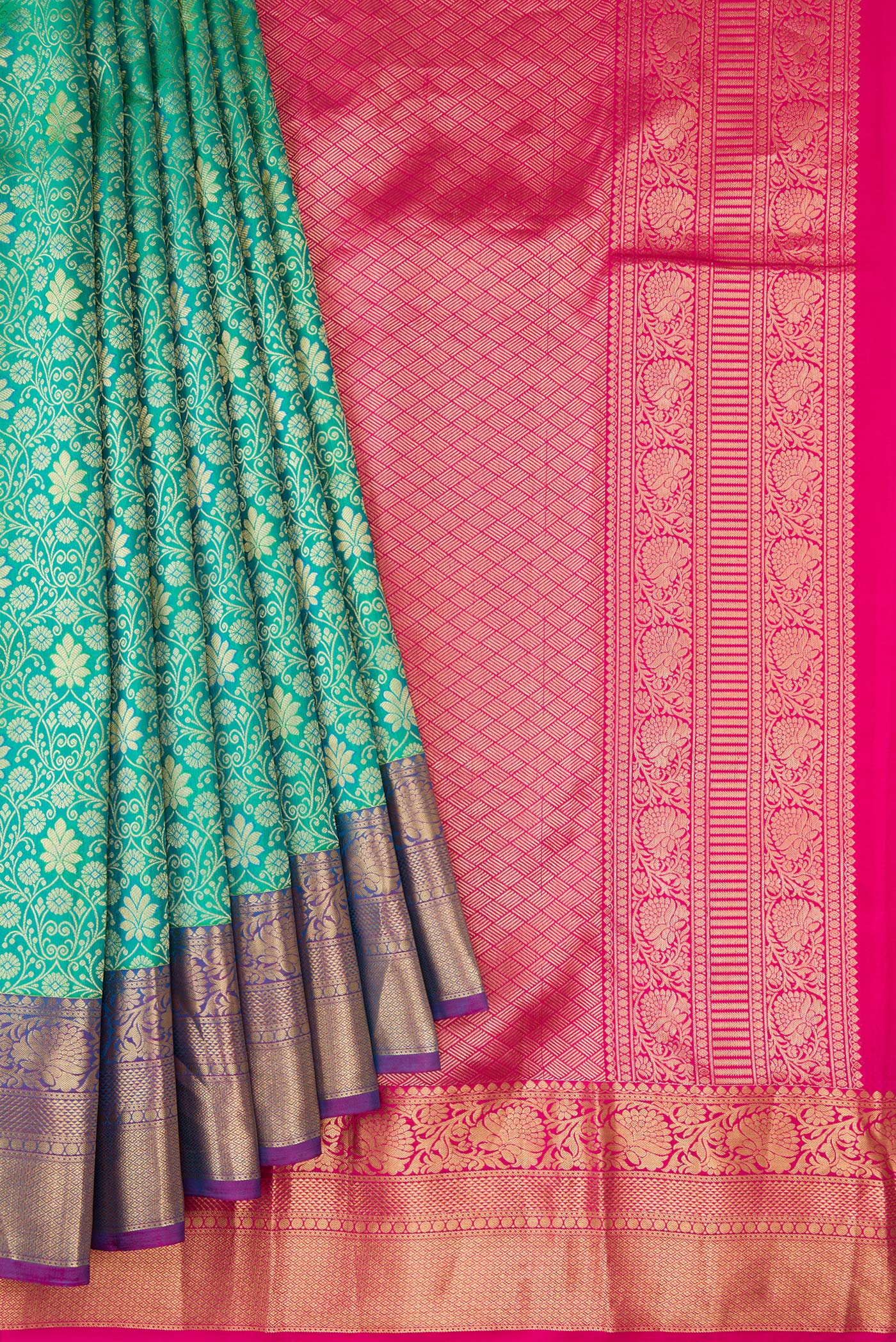 Pleats and pallu of Sea Green Kanchipuram Silk Saree with Zari Brocade on the body and Zari Border. 