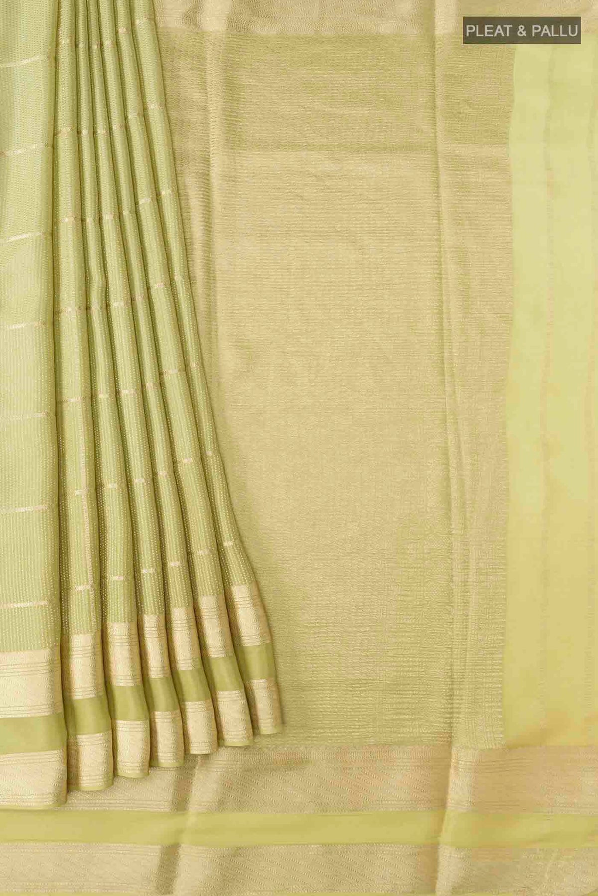 Pleats and pallu of Green Mysore Crepe Saree with Checked design on the body and Zari Border
