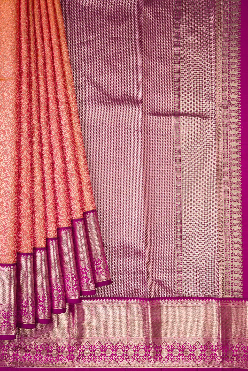 Pleats and pallu of Coral Dual Tone Kanchipuram Silk Saree with Zari Brocade on the body and Zari Border. 