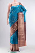 Blue Kanchipuram Silk Saree with Zari Butta on the body and Zari Border displayed on a mannequin