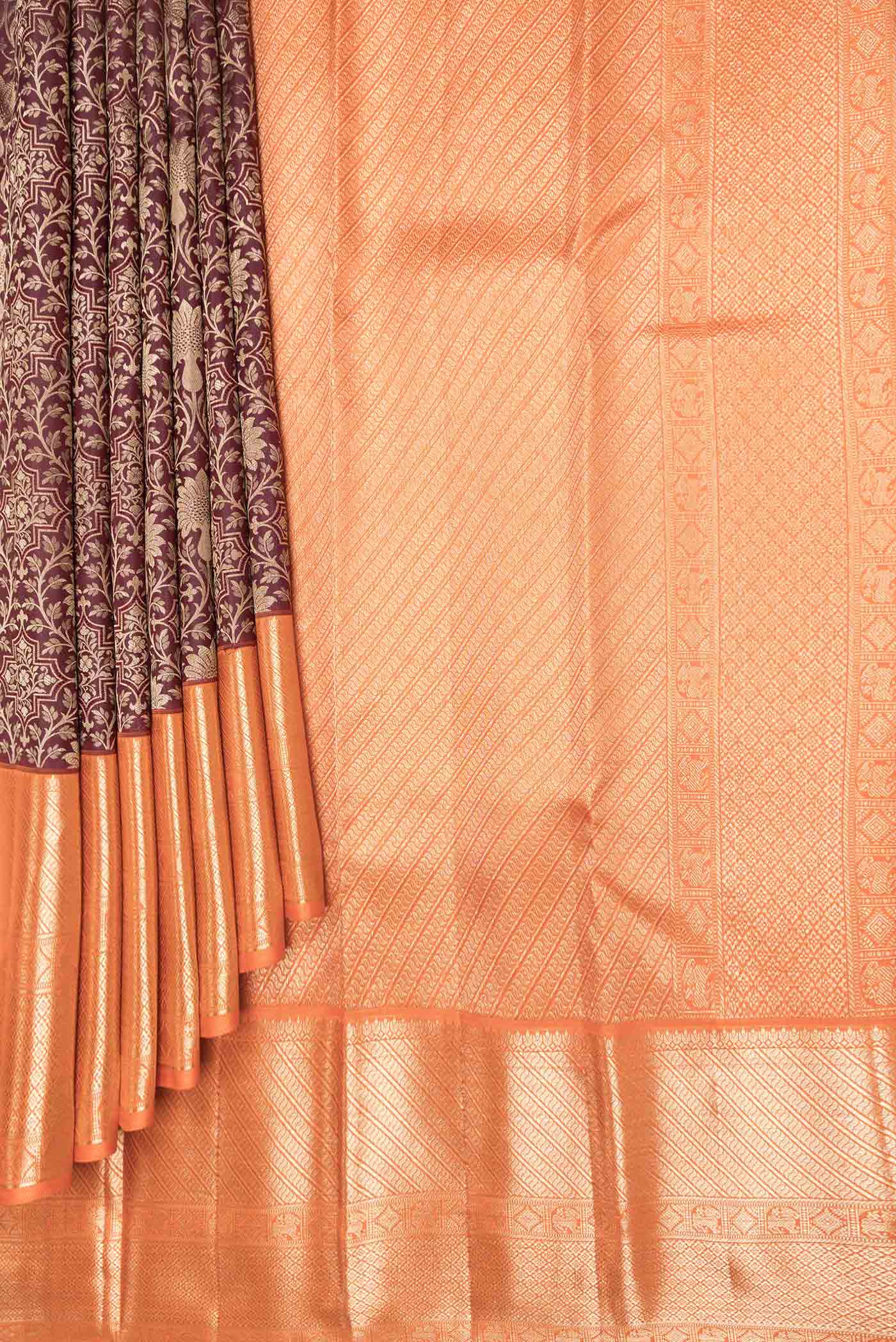 Pleats and pallu of Maroon Dual Tone Kanchipuram Saree with Zari Brocade on the body and Zari Border