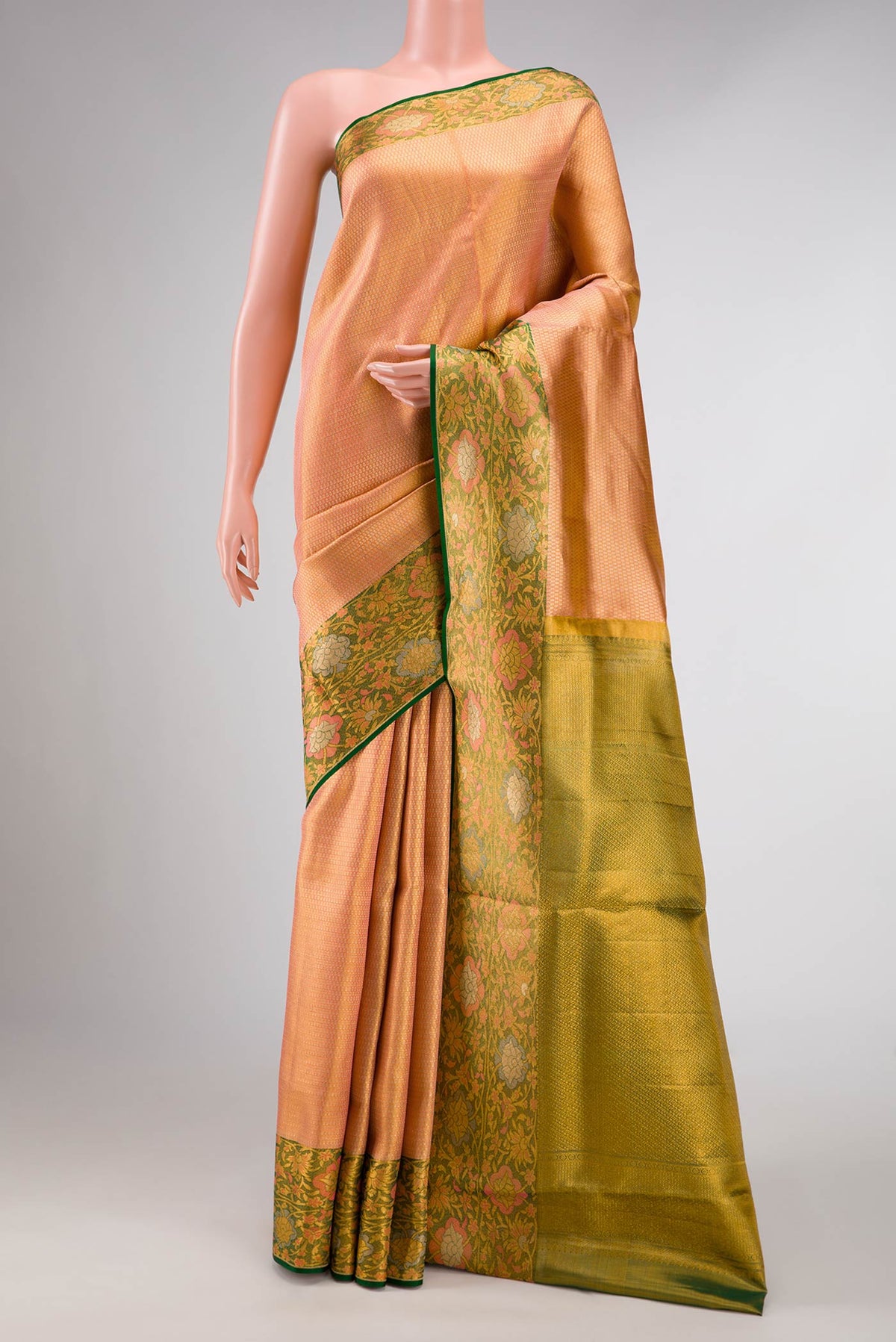 Orange Dual Tone Kanchipuram Tissue Silk Saree with Zari Brocade on the body and Zari Border displayed on a mannequin