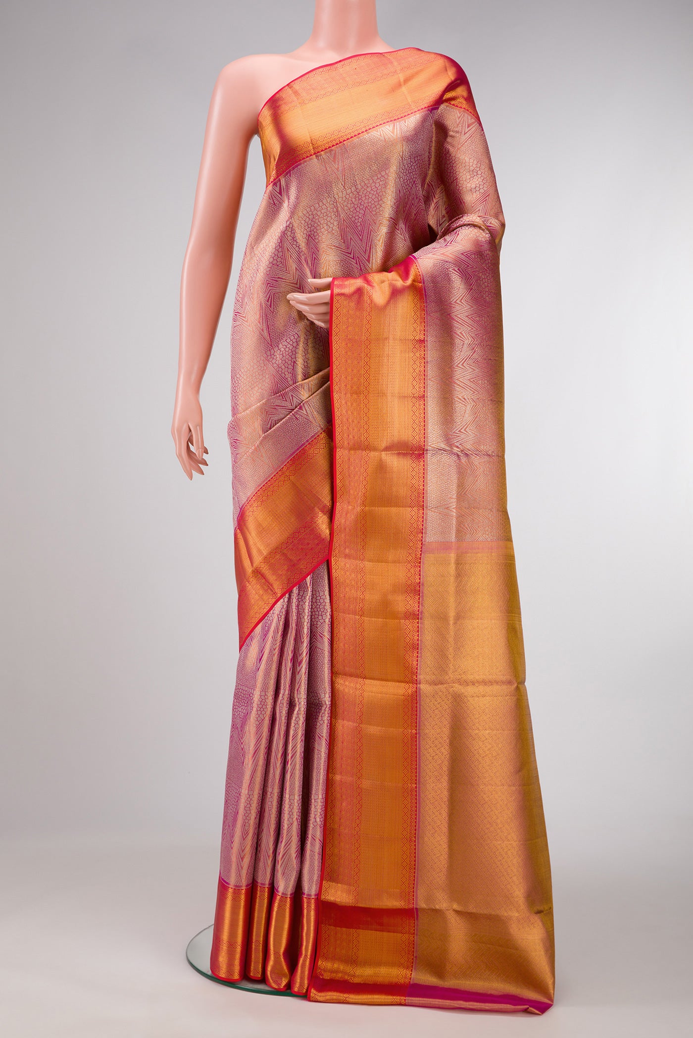Rose Gold Dual Tone Kanchipuram Tissue Silk Saree with Zari Brocade on the body and Zari Border.  displayed on a mannequin