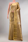 Pure Silk Pure Zari Dark Beige Dual Tone Kanchipuram Saree with Zari Brocade on the body and Zari Border displayed on a mannequin