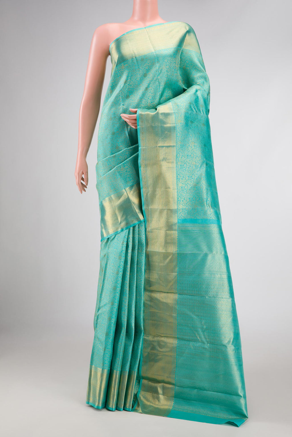 Sky Blue Dual Tone Kanchipuram Silk Saree with Zari Brocade on the body and Zari Border displayed on a mannequin