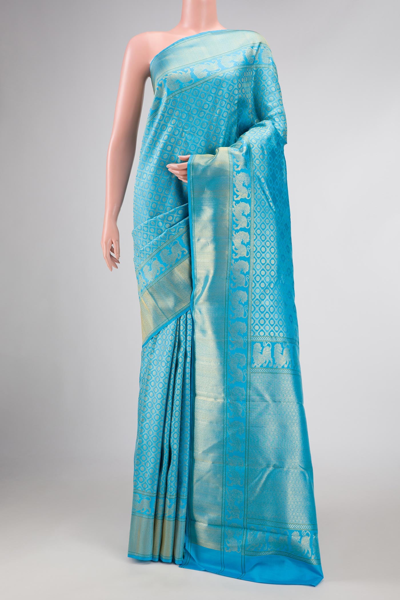Pure Silk Pure Zari Sky Blue Dual Tone Kanchipuram Saree with Zari Brocade on the body and Fancy Border displayed on a mannequin