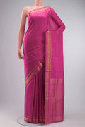 Pink Soft Silk Saree with Zari Butta on the body and Zari Border displayed on a mannequin