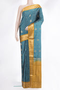 Pure Silk Green Soft Saree with Zari Butta on the body and Zari Border.  displayed on a mannequin