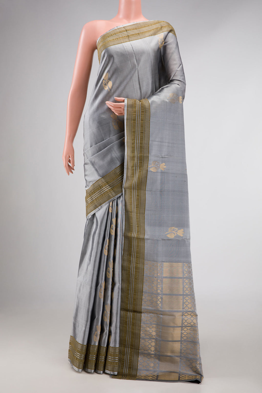 Grey Dual Tone Soft Silk Saree with Zari Butta on the body and Zari Border displayed on a mannequin