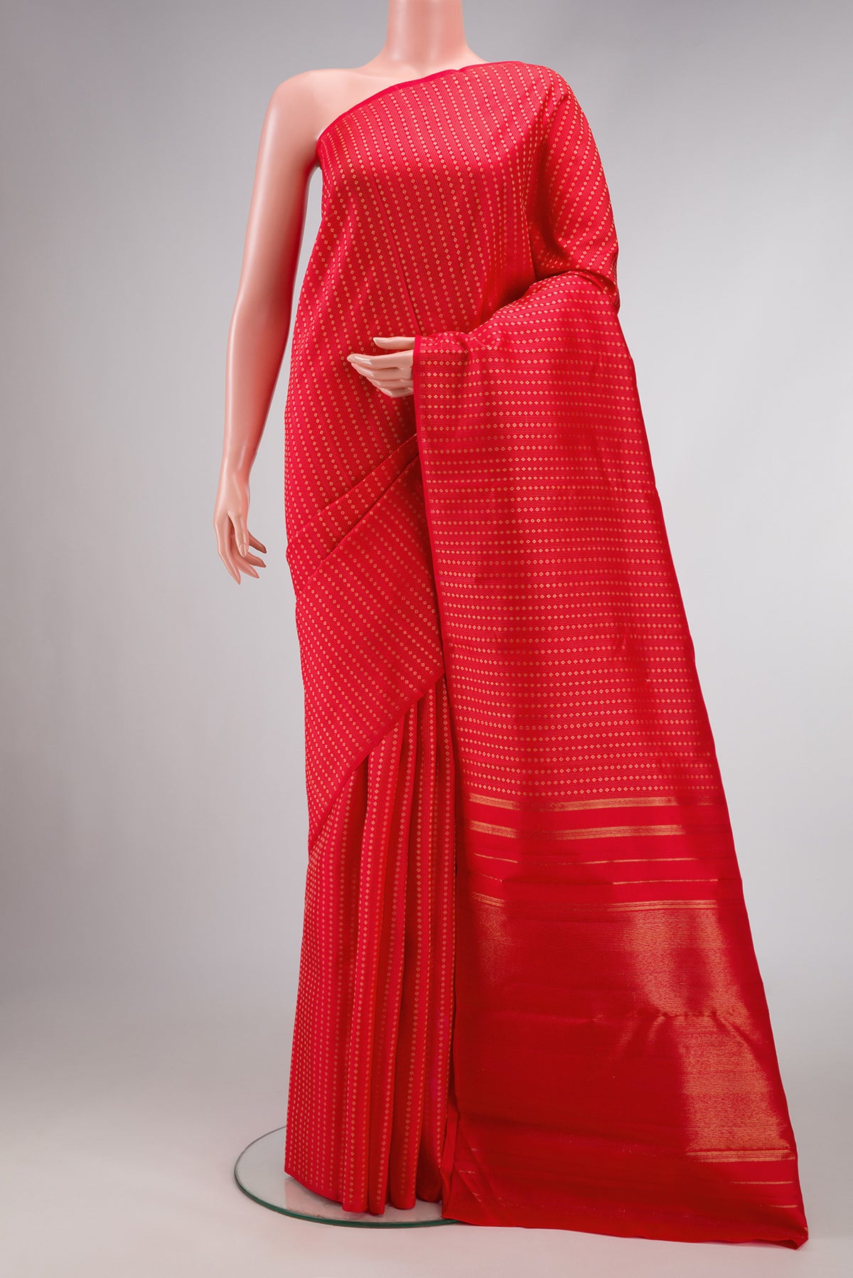 Red Dual Tone Kanjivaram Silk Saree with Stripes on the body and Without Border.  displayed on a mannequin