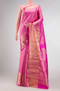 Pure Silk Pure Zari Pink Dual Tone Kanjivaram Saree with Zari Brocade on the body and Zari Border.  displayed on a mannequin