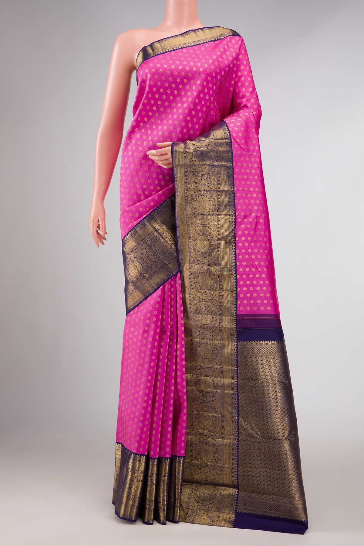Pure Silk Pure Zari Pink Dual Tone Kanchipuram Saree with Zari Brocade on the body and Zari Border displayed on a mannequin