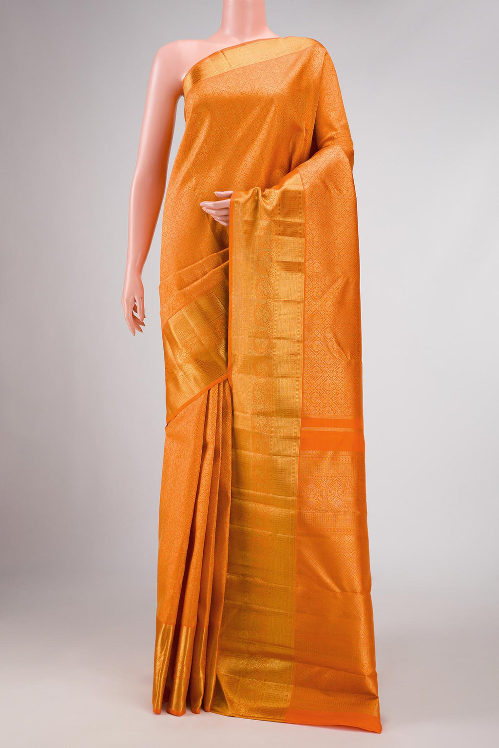 Pure Silk Pure Zari Orange Dual Tone Kanchipuram Saree with Zari Brocade on the body and Zari Border displayed on a mannequin
