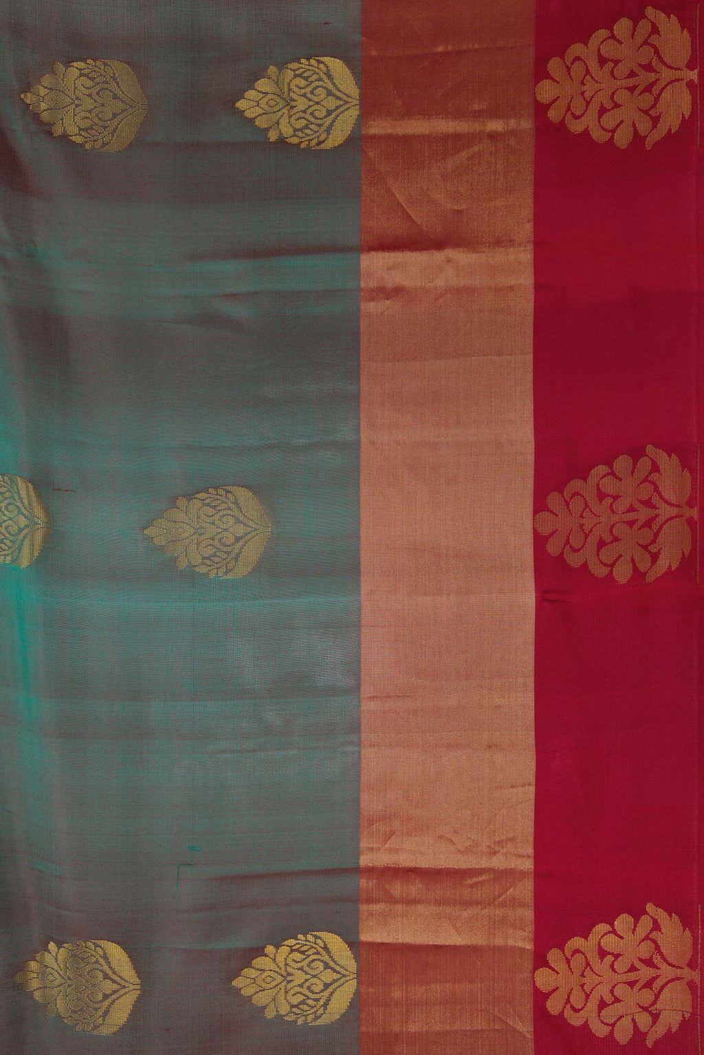 Border image of Bottle Green Dual Tone Soft Silk Saree with Zari Butta on the body and Fancy Border. 