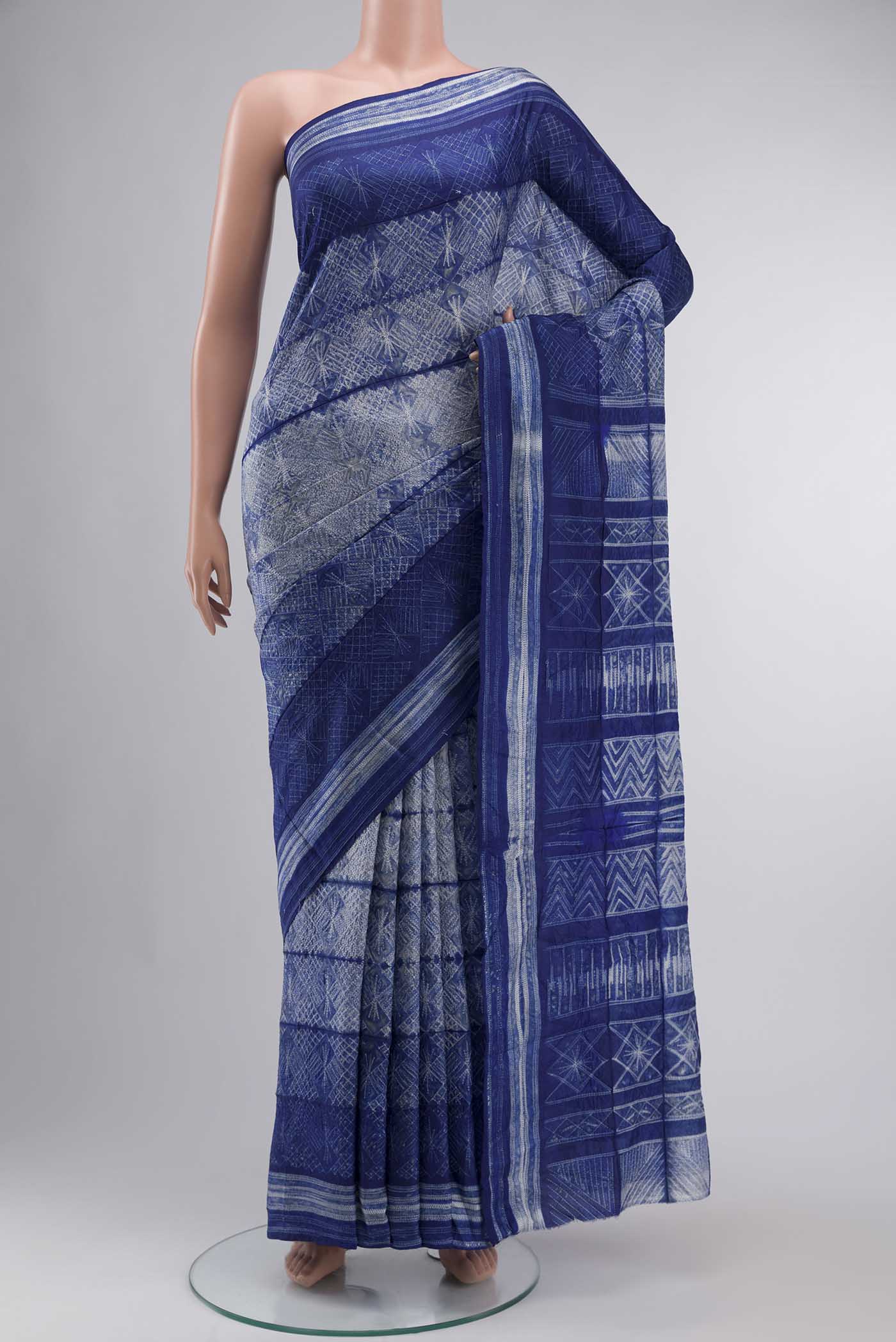 Blue Tussar Silk Saree Printed design on the body and Printed Border displayed on a mannequin