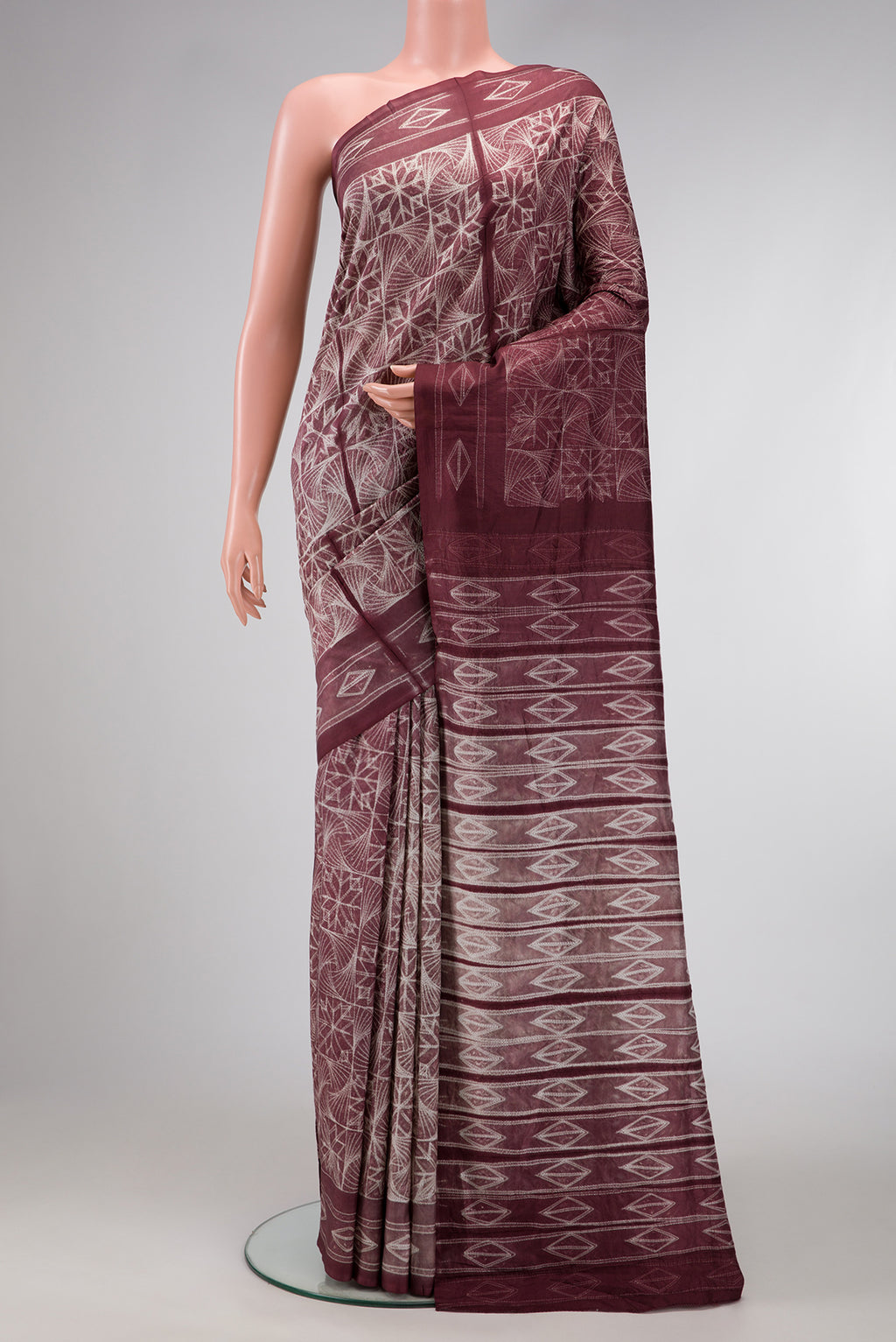 Brown Dual Tone Tussar Silk Saree with Printed design on the body and Printed Border.  displayed on a mannequin
