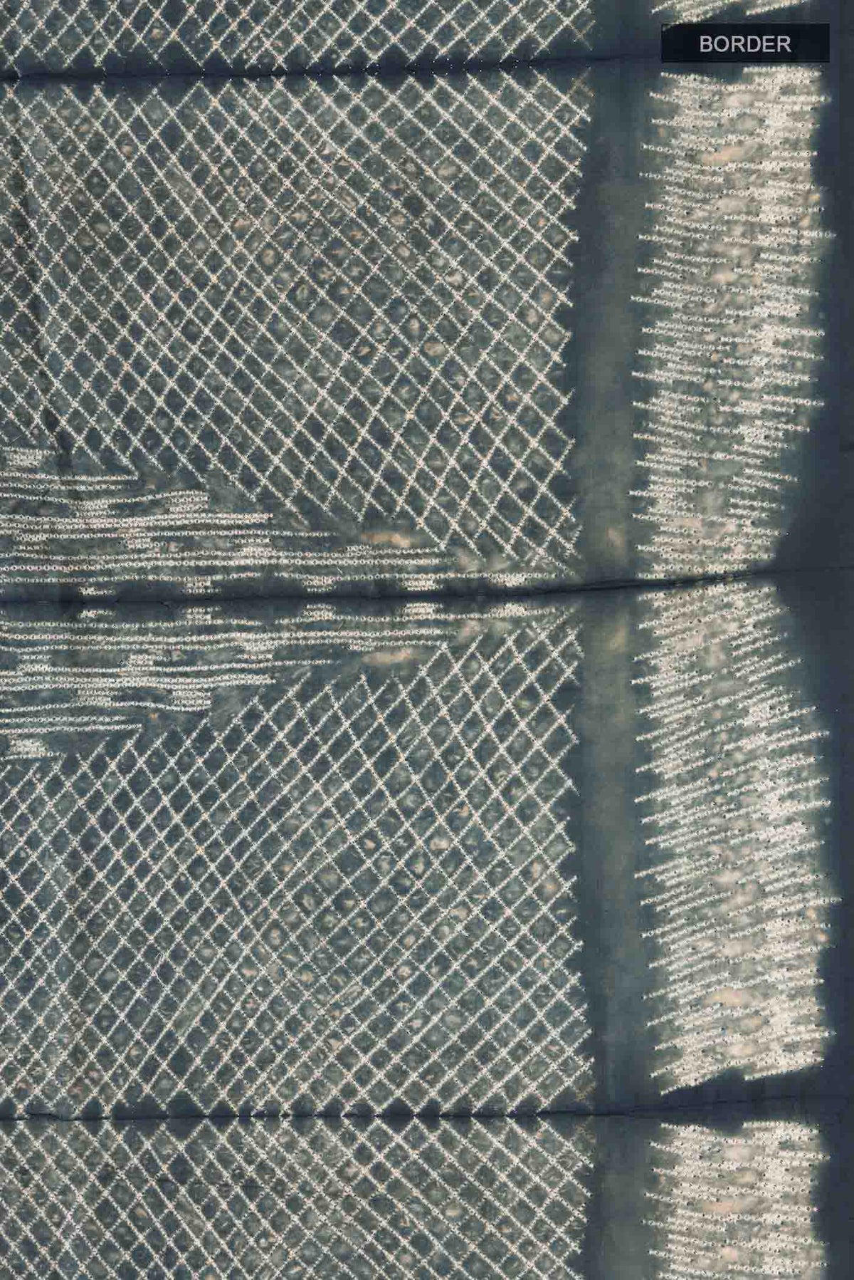 Border image of Grey Printed Silk SareePrinted design on the body and Printed Border