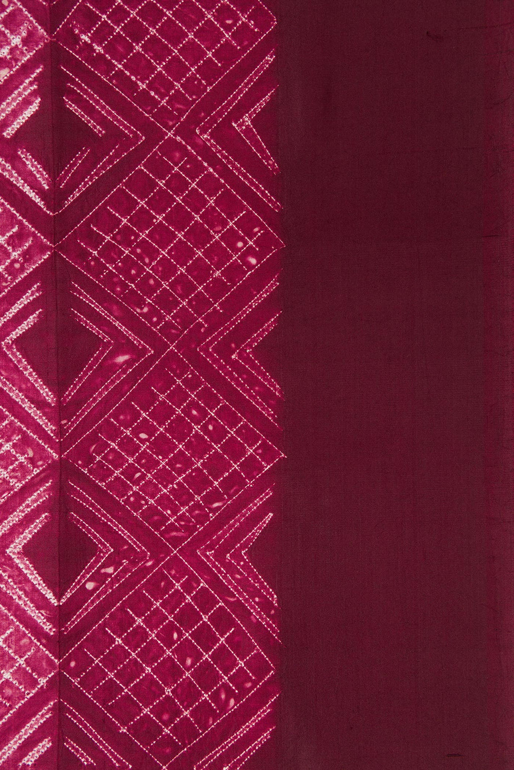 Border image of Maroon Dual Tone Tussar Silk Saree with Printed design on the body and Plain Border. 