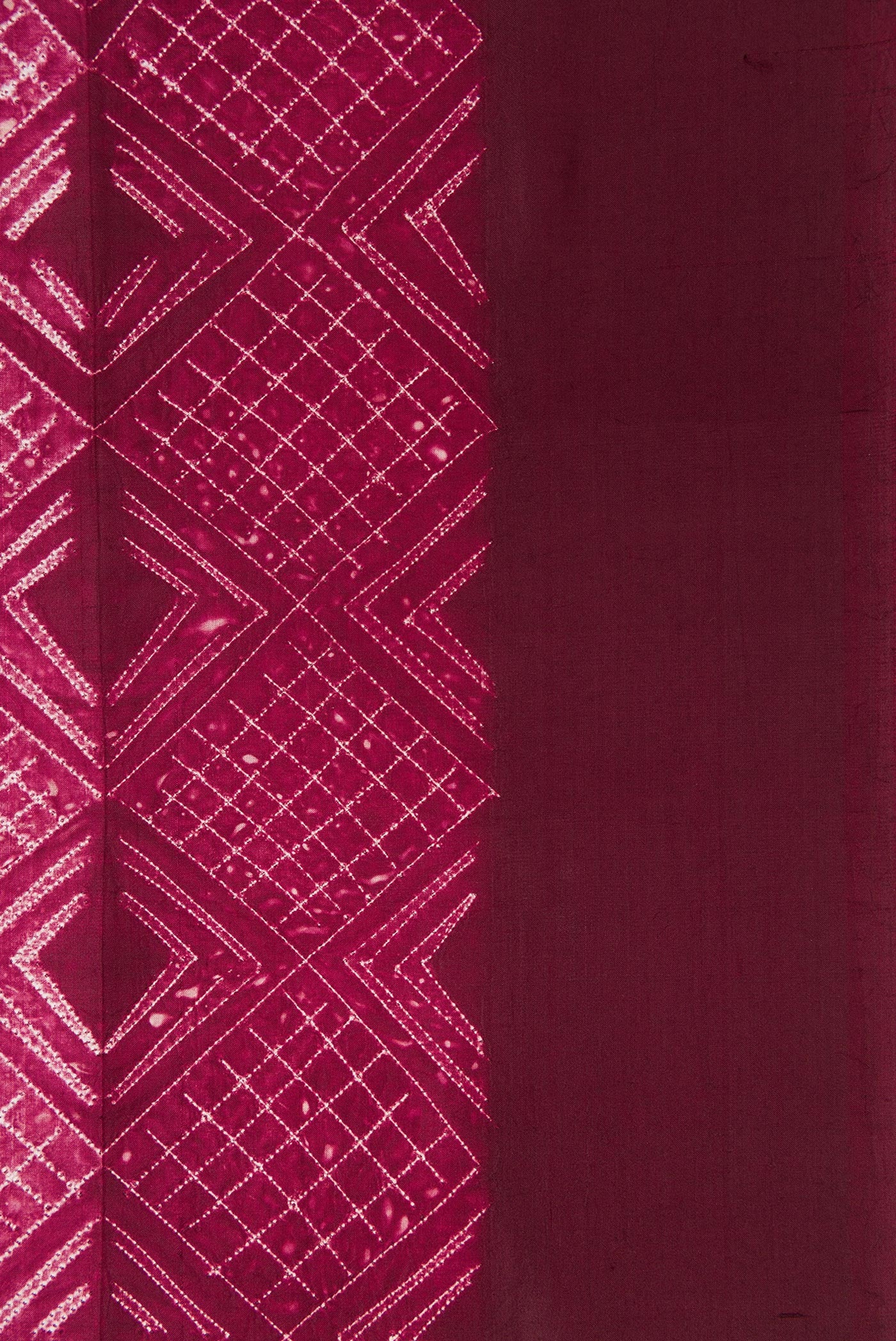 Border image of Maroon Dual Tone Tussar Silk Saree with Printed design on the body and Plain Border. 