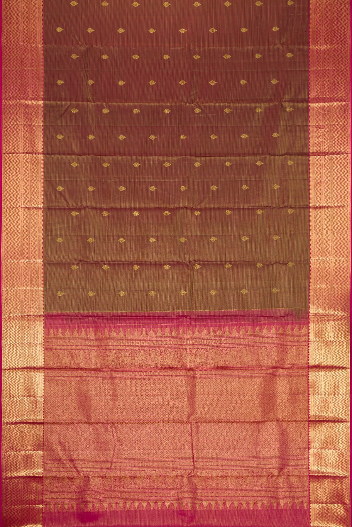 Flat view of Maroon Dual Tone Kanchipuram Silk Saree with Zari Butta on the body and Zari Border. 