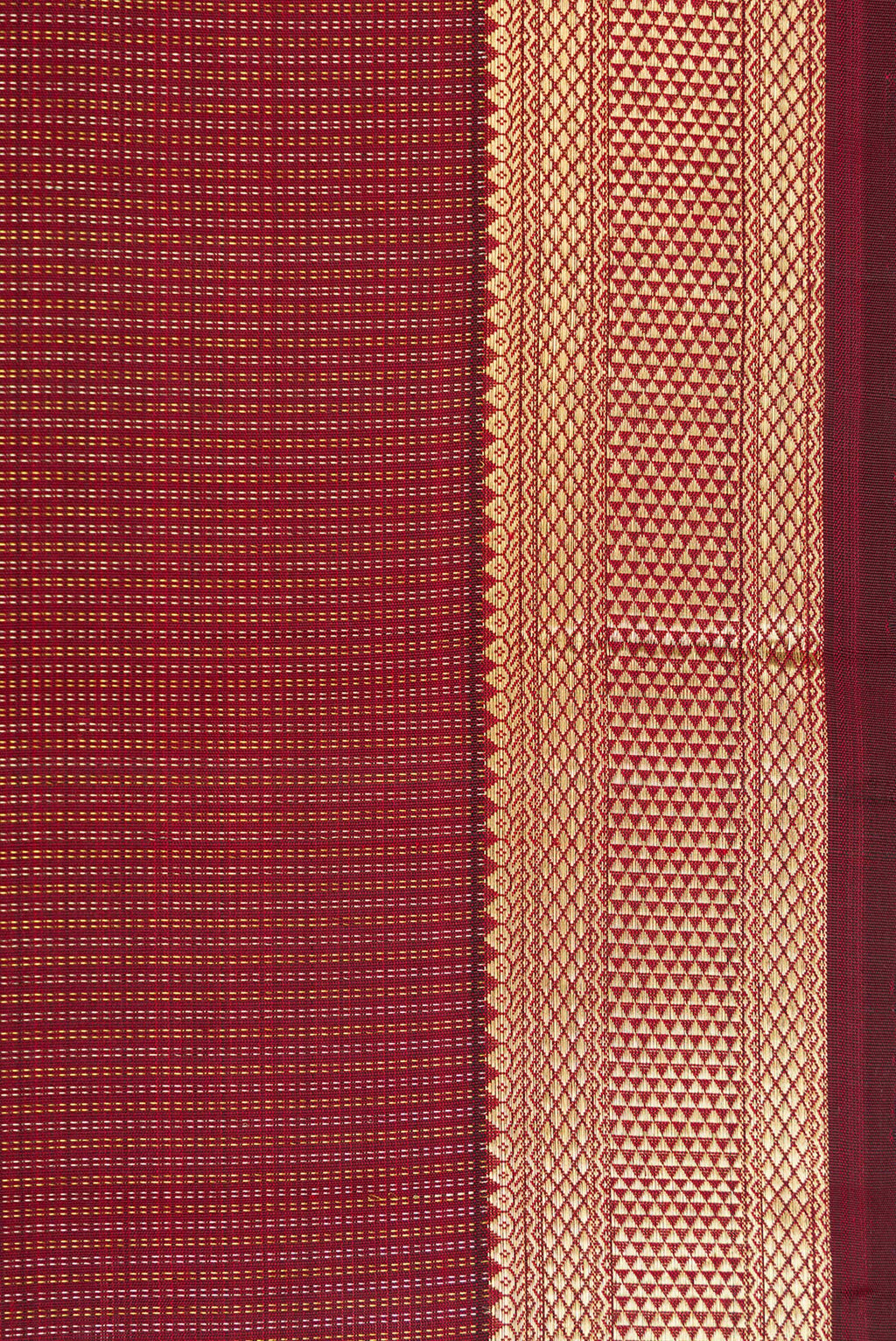 Border image of Maroon Dual Tone Kanchipuram Silk Saree with Stripes on the body and Zari Border. 