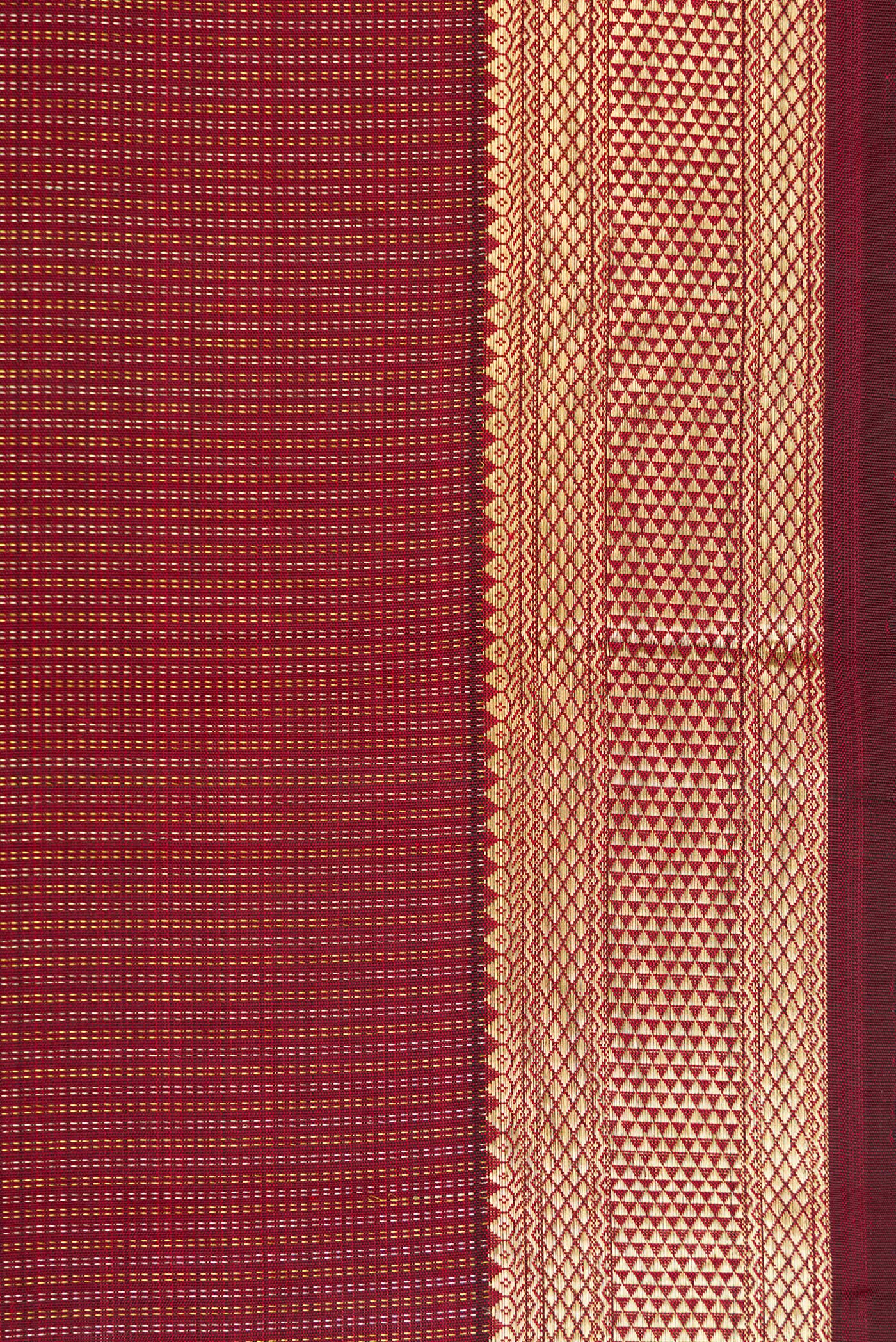 Border image of Maroon Dual Tone Kanchipuram Silk Saree with Stripes on the body and Zari Border. 