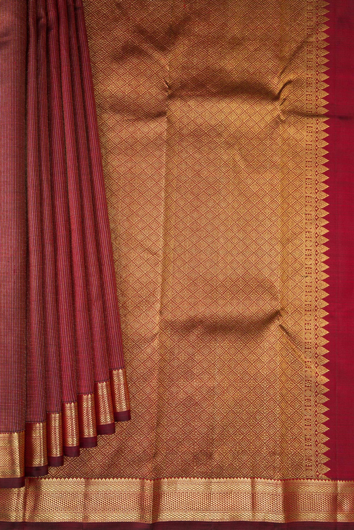 Pleats and pallu of Maroon Dual Tone Kanchipuram Silk Saree with Stripes on the body and Zari Border. 