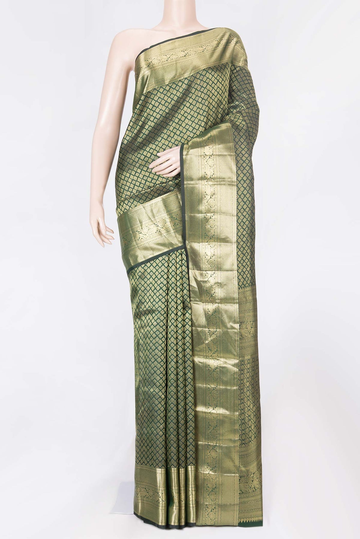 Green Dual Tone Kanchipuram Saree with Zari Brocade on the body and Zari Border displayed on a mannequin