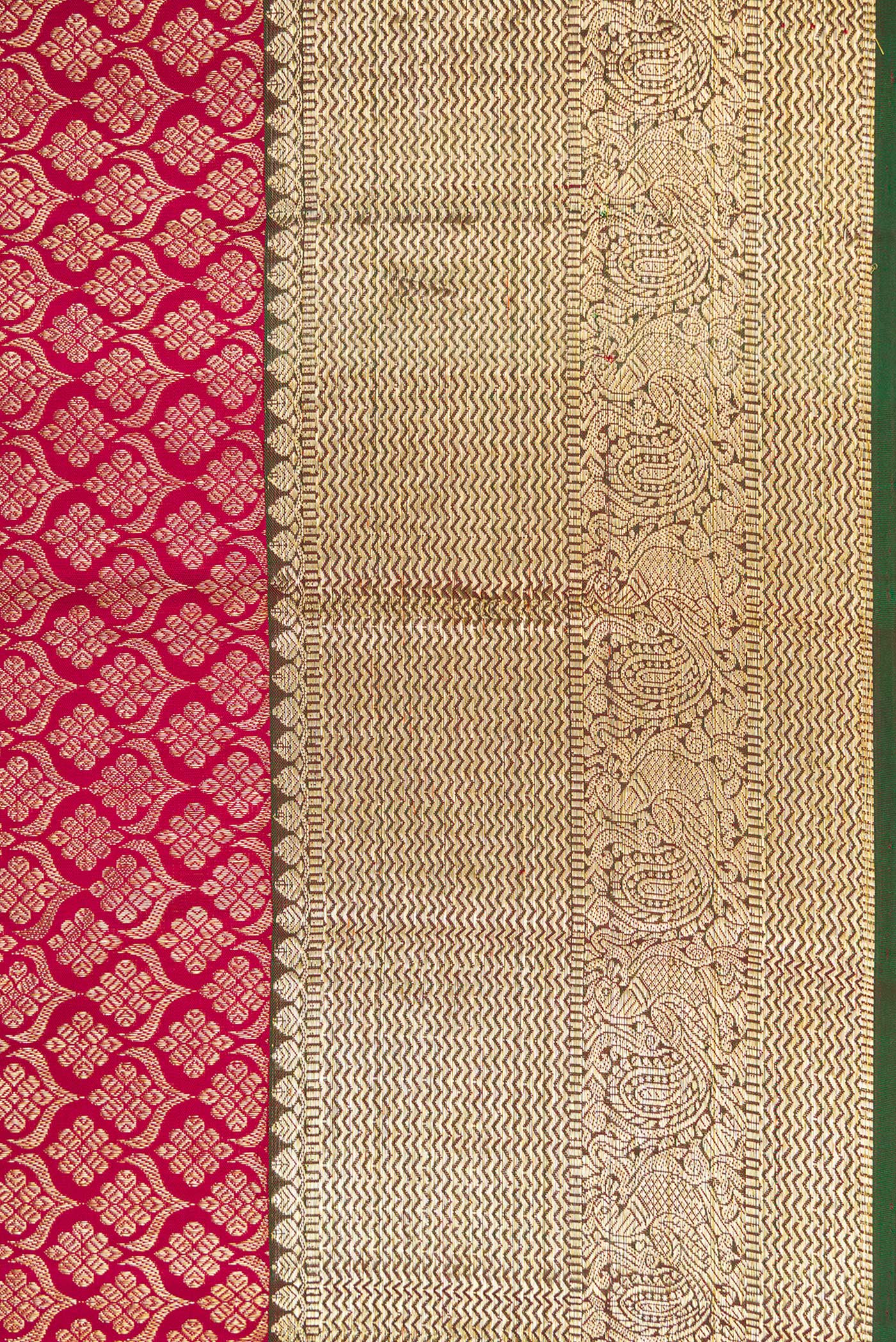 Border image of Magenta Dual Tone Kanjivaram Silk Saree with Zari Brocade on the body and Zari Border. 