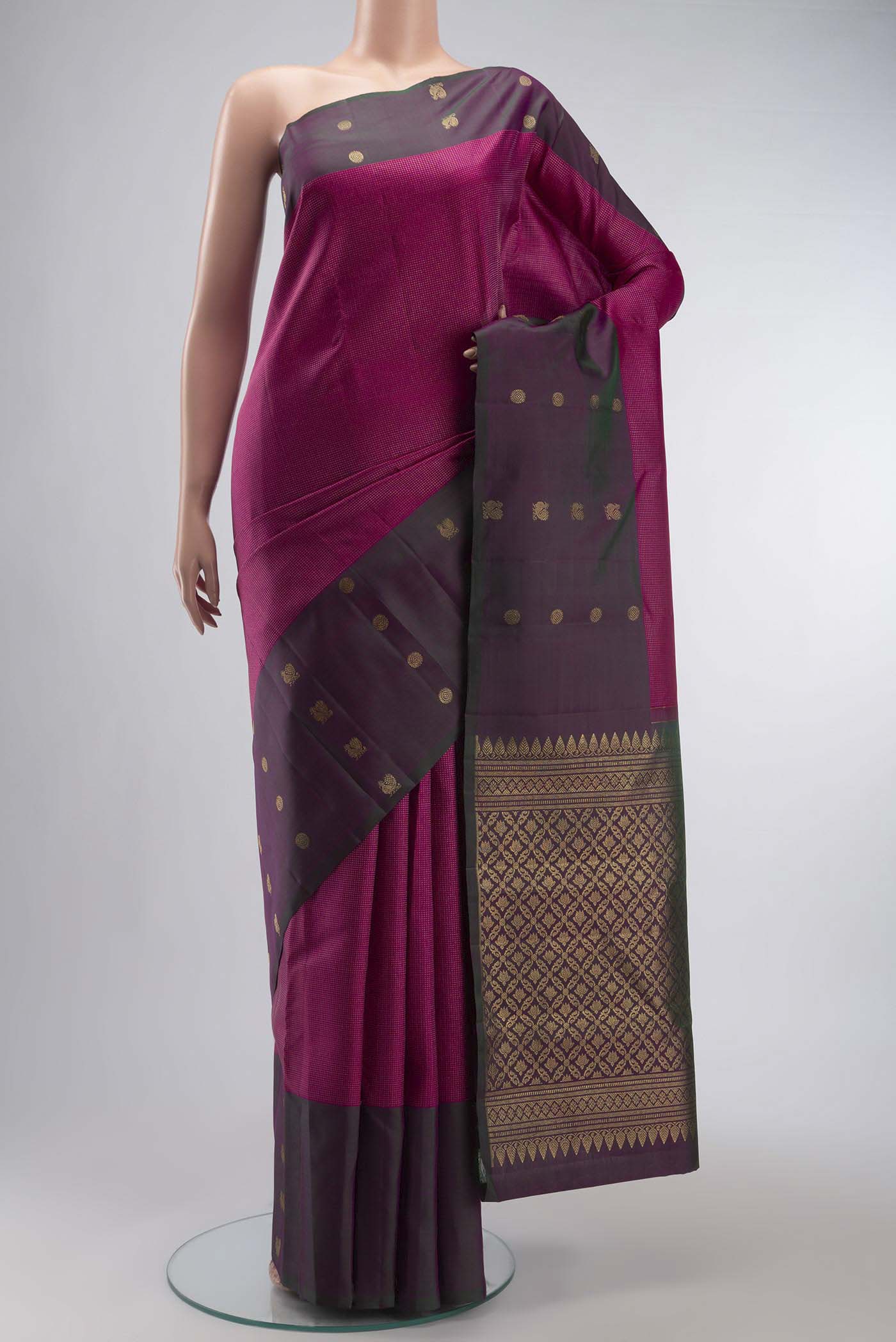 Pink Kanchipuram Silk Saree with Zari Butta on the body and Zari Border displayed on a mannequin