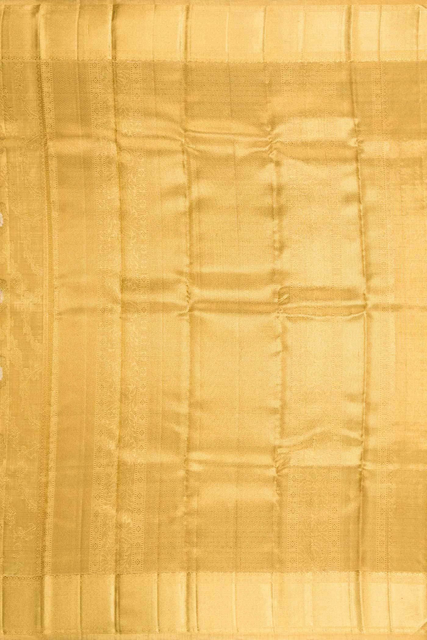 Close up image of the pallu of Pure Silk Pure Zari Gold Dual Tone Kanchipuram Tissue Saree with Zari Brocade on the body and Zari Border