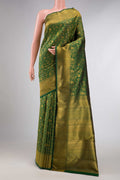 Pure Silk Pure Zari Green Dual Tone Kanchipuram Saree with Zari Brocade on the body and Zari Border displayed on a mannequin