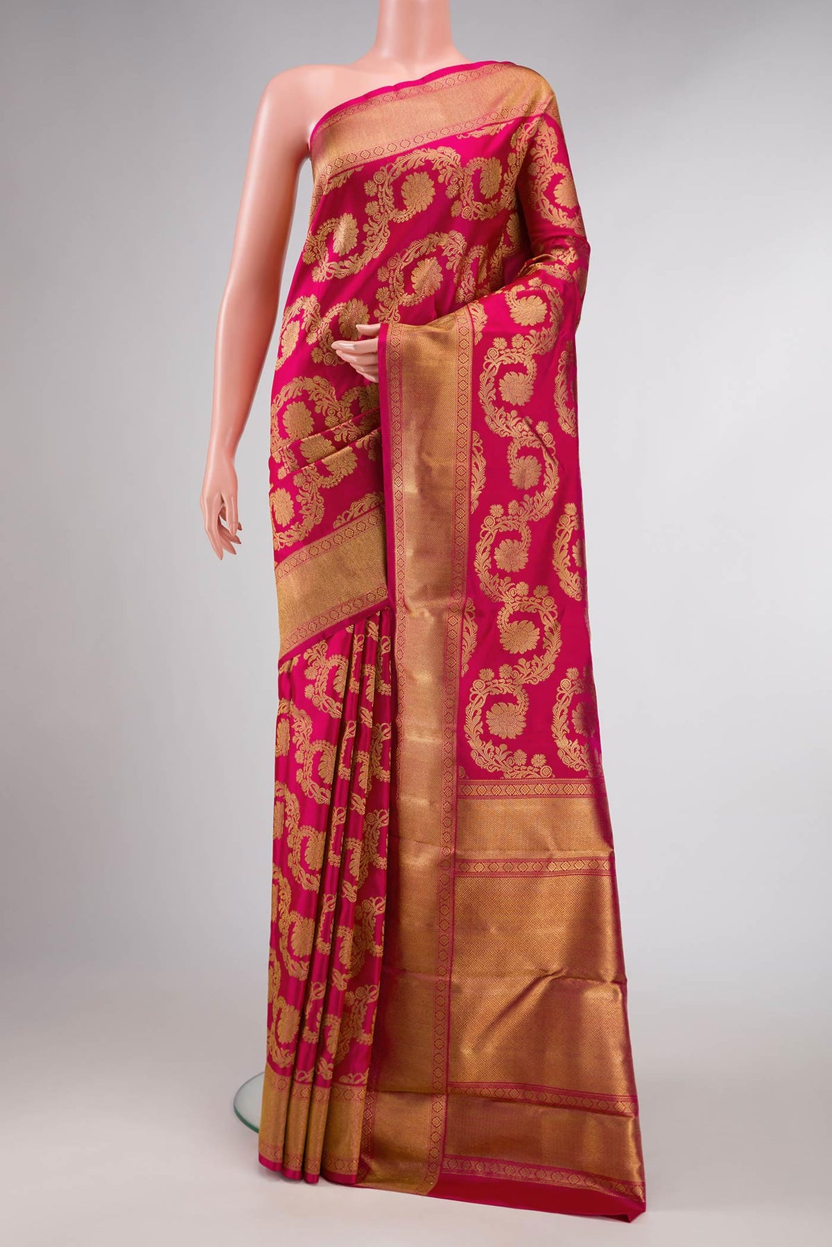 Pure Silk Pure Zari Dark Pink Dual Tone Kanchipuram Saree with Zari Brocade on the body and Zari Border displayed on a mannequin