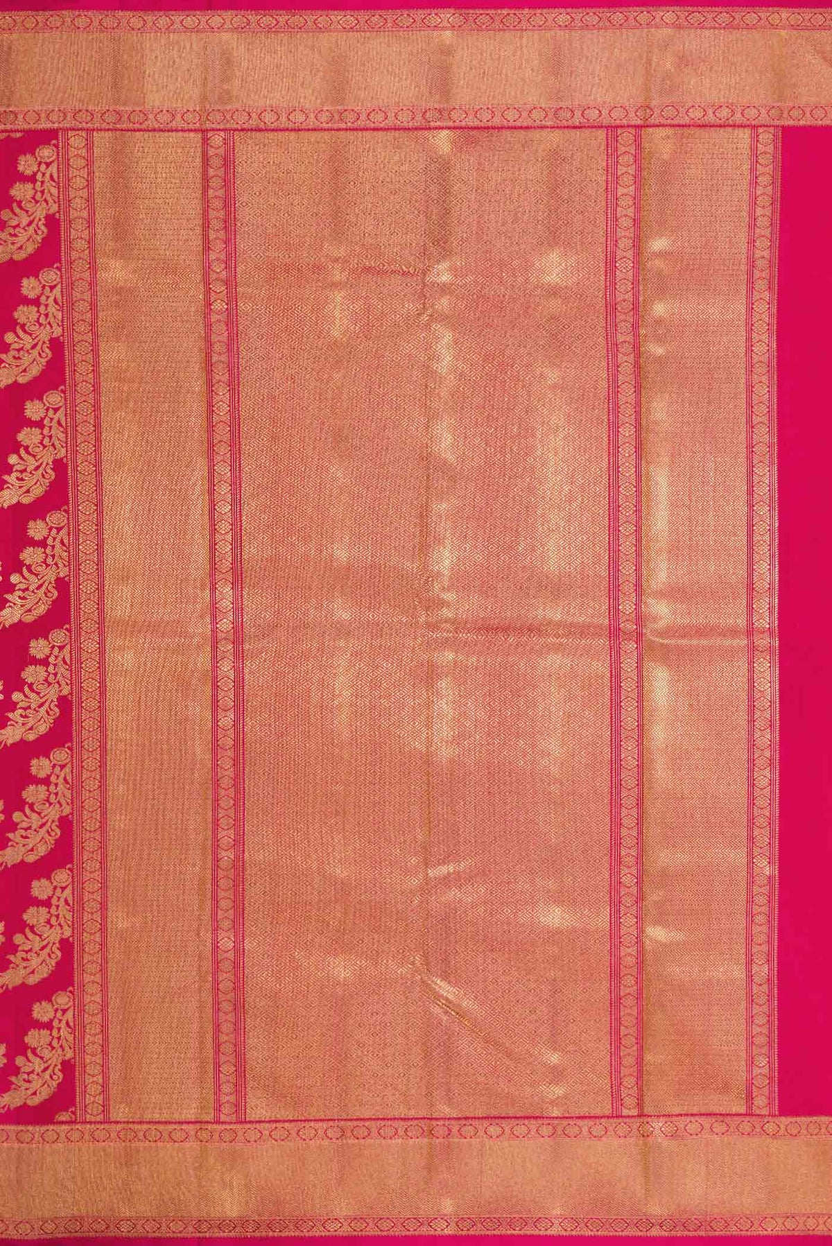Close up image of the pallu of Pure Silk Pure Zari Dark Pink Dual Tone Kanchipuram Saree with Zari Brocade on the body and Zari Border