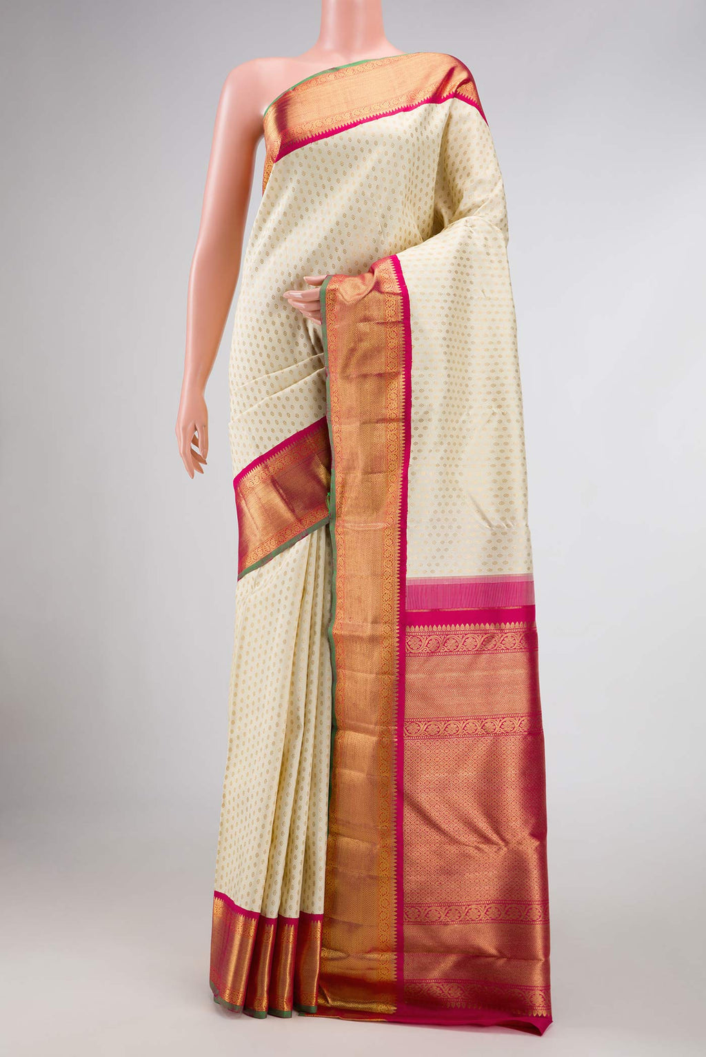 Off White Dual Tone Kanchipuram Silk Saree with Zari Brocade on the body and Zari Border displayed on a mannequin