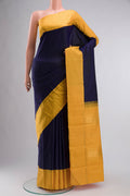 Pure Silk Pure Zari Navy Blue Kanchipuram Saree with Plain Body and Checks Border displayed on a mannequin