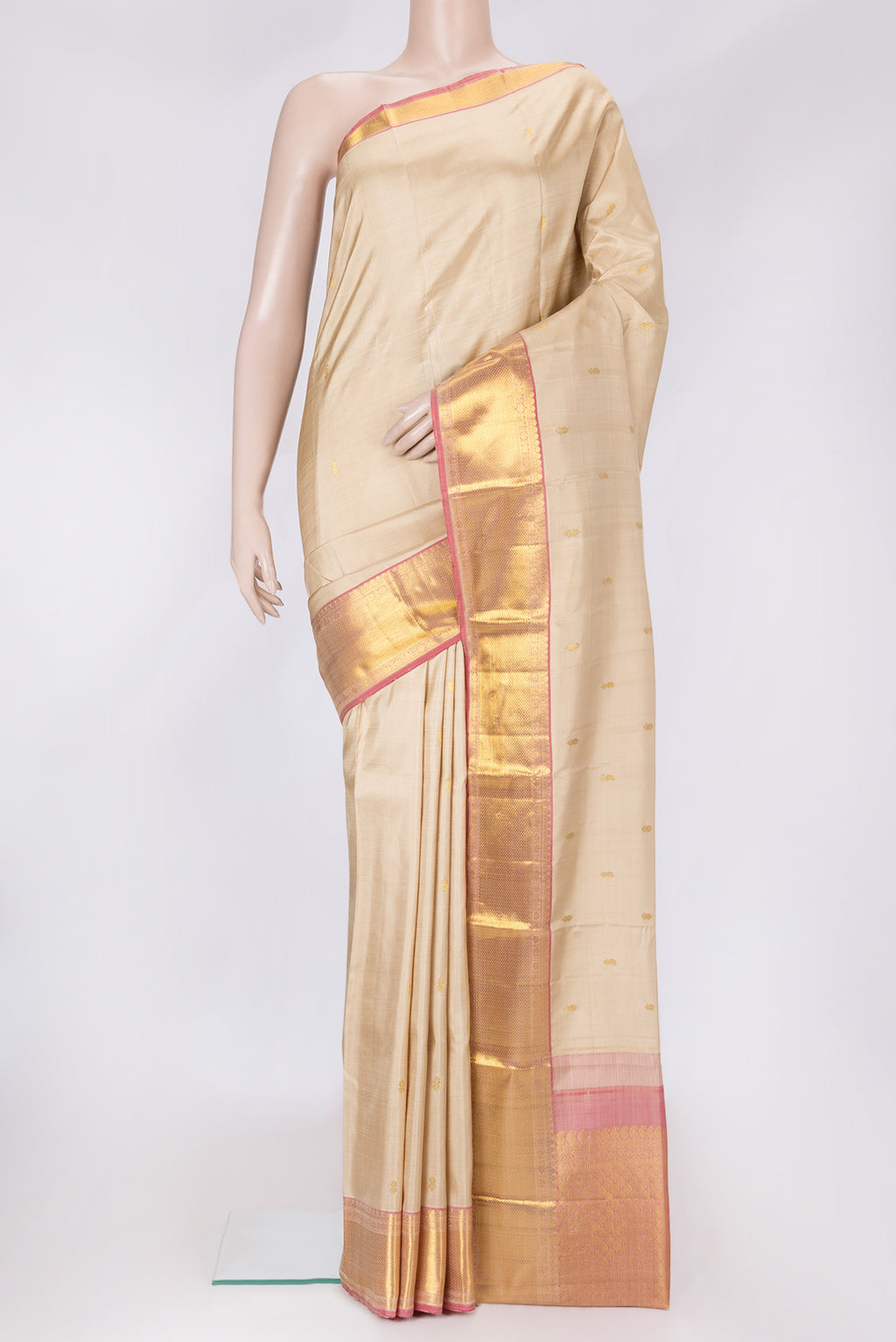 Pink Dual Tone Kanjivaram Silk Saree with Checked design on the body and Zari Border.  displayed on a mannequin
