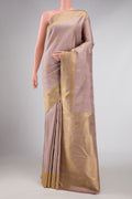 Pure Silk Pure Zari Rose Gold Dual Tone Kanchipuram Saree with Zari Butta on the body and Zari Border displayed on a mannequin