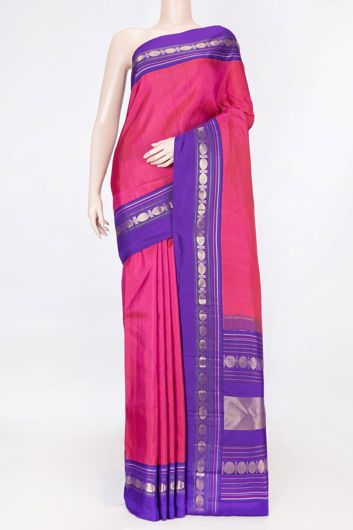 Pink Dual Tone Kanchipuram Saree with Stripes on the body and Zari Border displayed on a mannequin