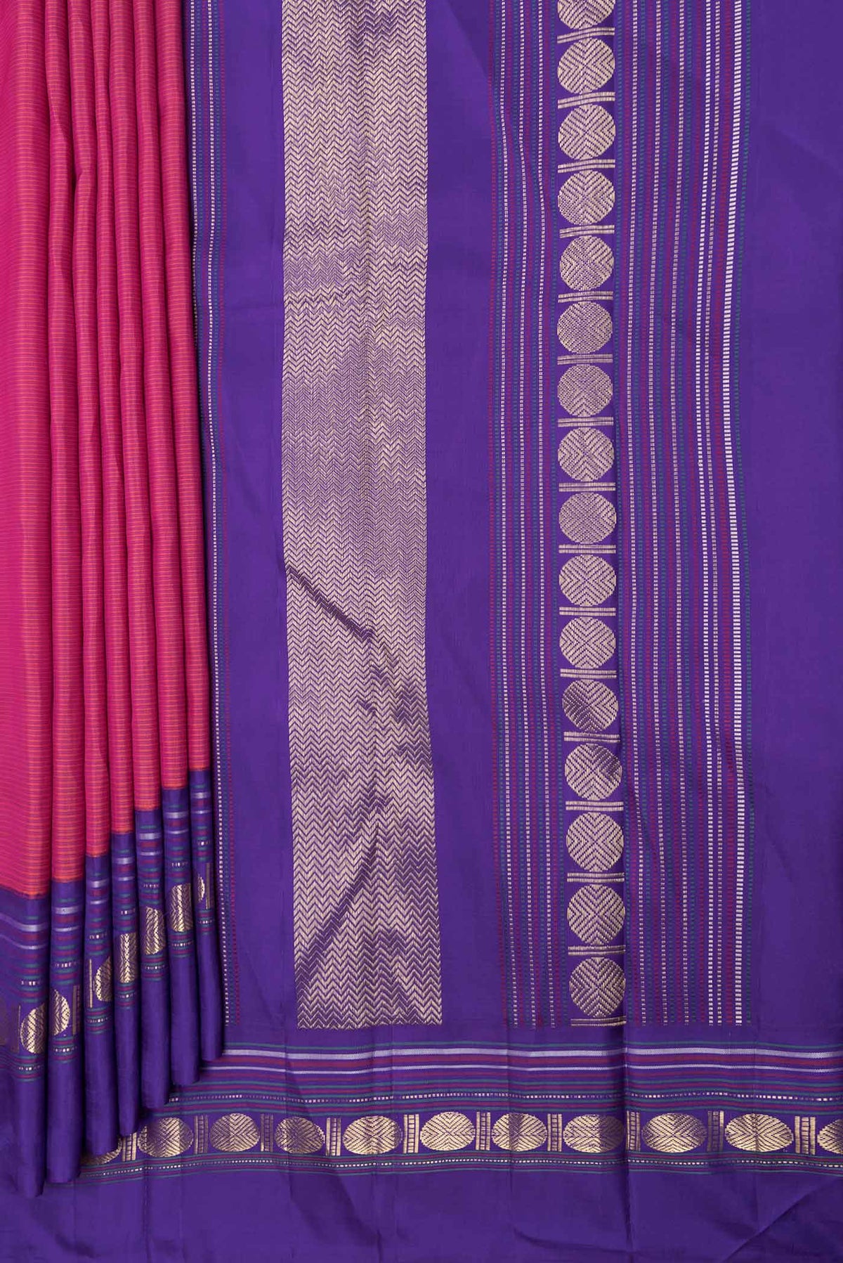 Pleats and pallu of Pink Dual Tone Kanchipuram Saree with Stripes on the body and Zari Border