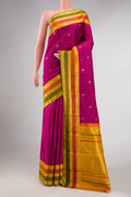 Pure Silk Pure Zari Magenta Dual Tone Kanchipuram Saree with Zari Butta on the body and Zari Border displayed on a mannequin