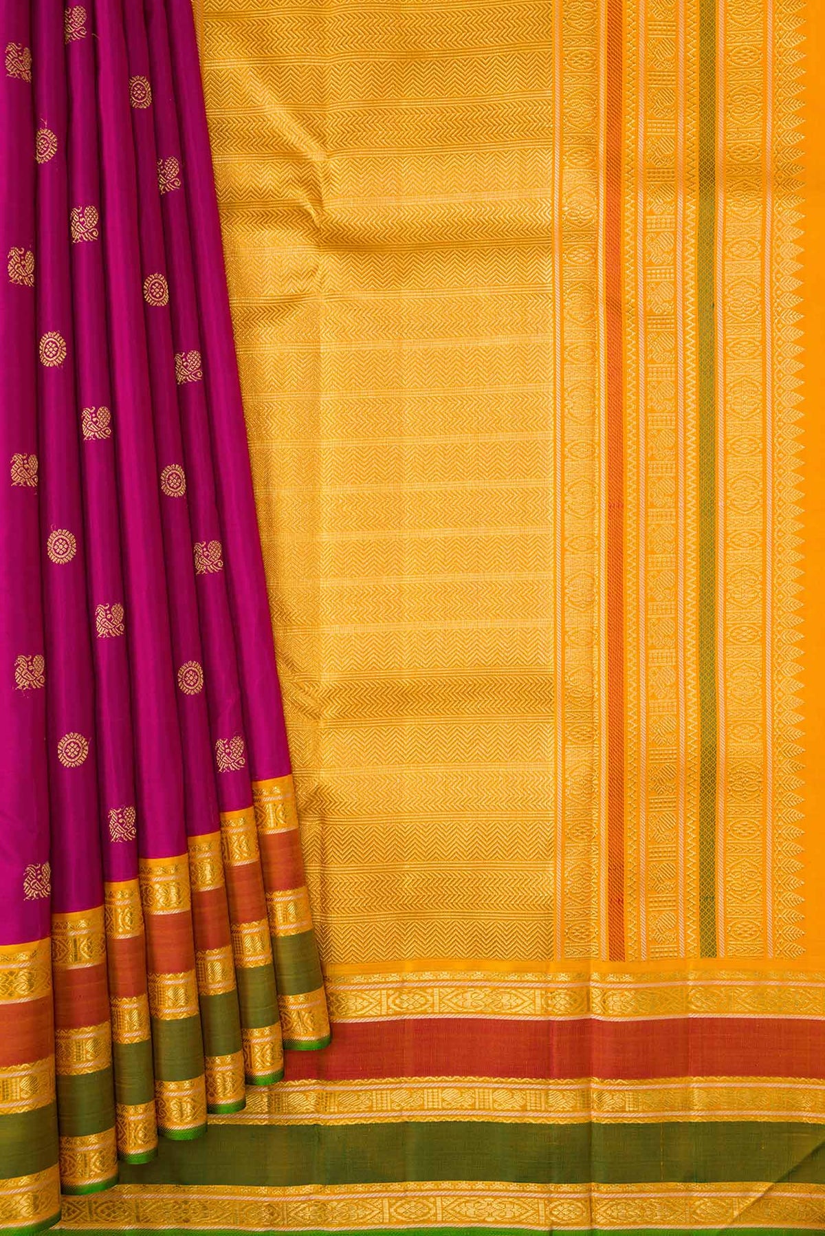 Pleats and pallu of Pure Silk Pure Zari Magenta Dual Tone Kanchipuram Saree with Zari Butta on the body and Zari Border