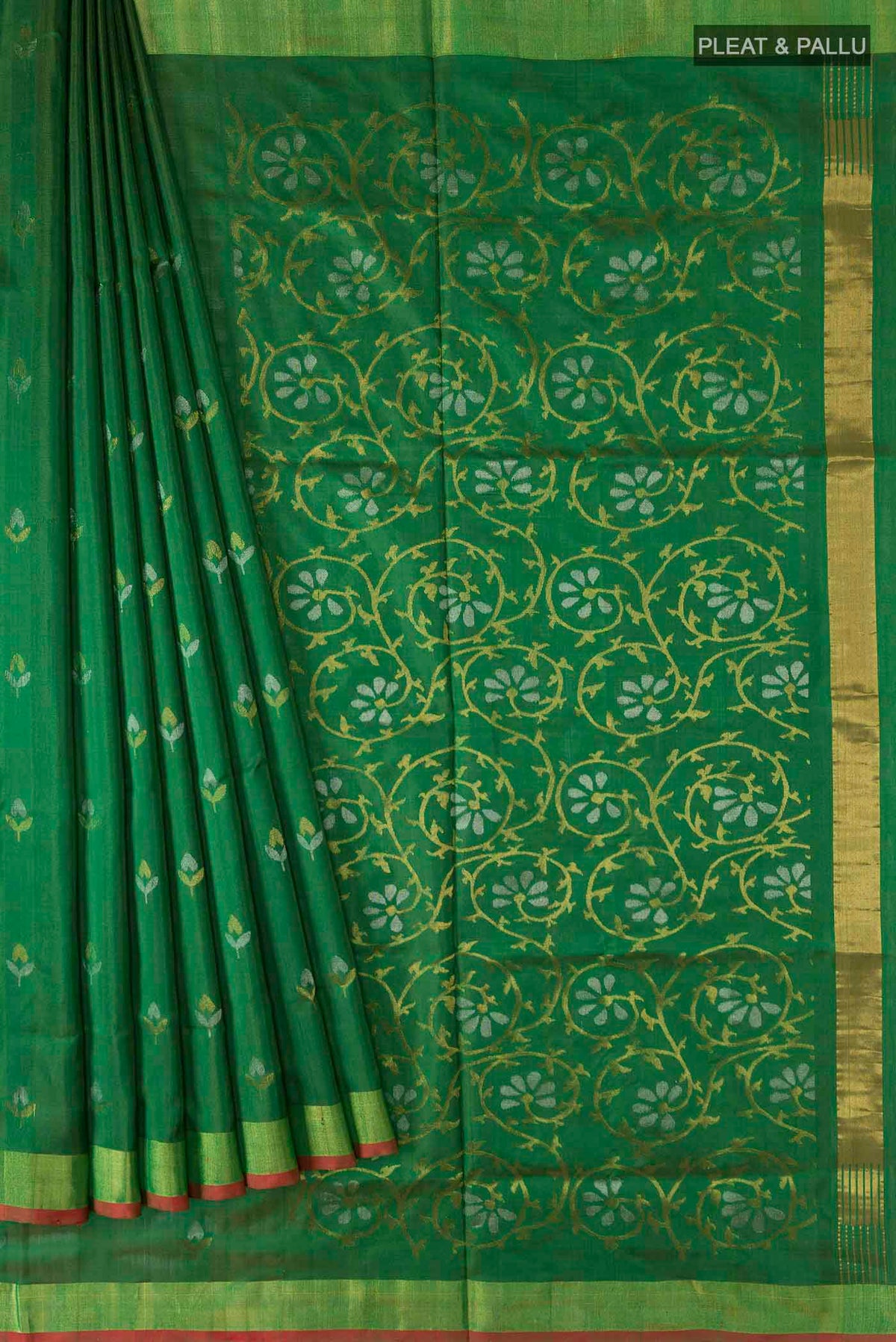 Pleats and pallu of Green Uppada Silk Saree with Zari Butta on the body and Zari Border