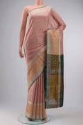 Pink Uppada Silk Saree with Zari Butta on the body and Zari Border displayed on a mannequin