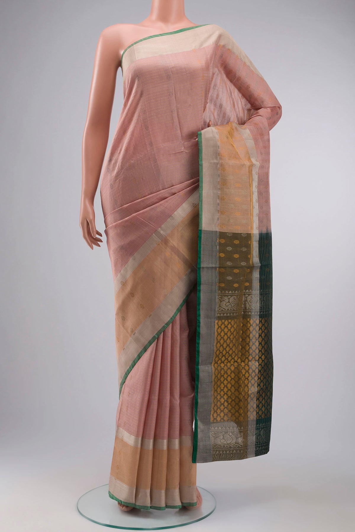 Pink Uppada Silk Saree with Zari Butta on the body and Zari Border displayed on a mannequin