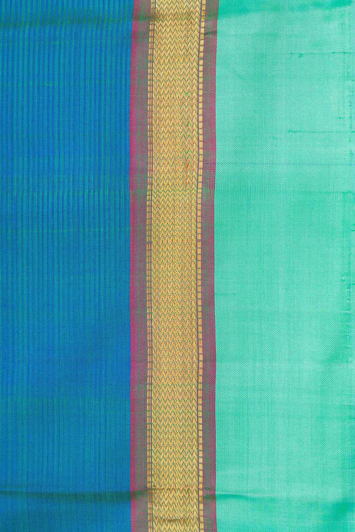 Border image of Peacock Blue Dual Tone Kanchipuram Silk Saree with Plain Body and Zari Border