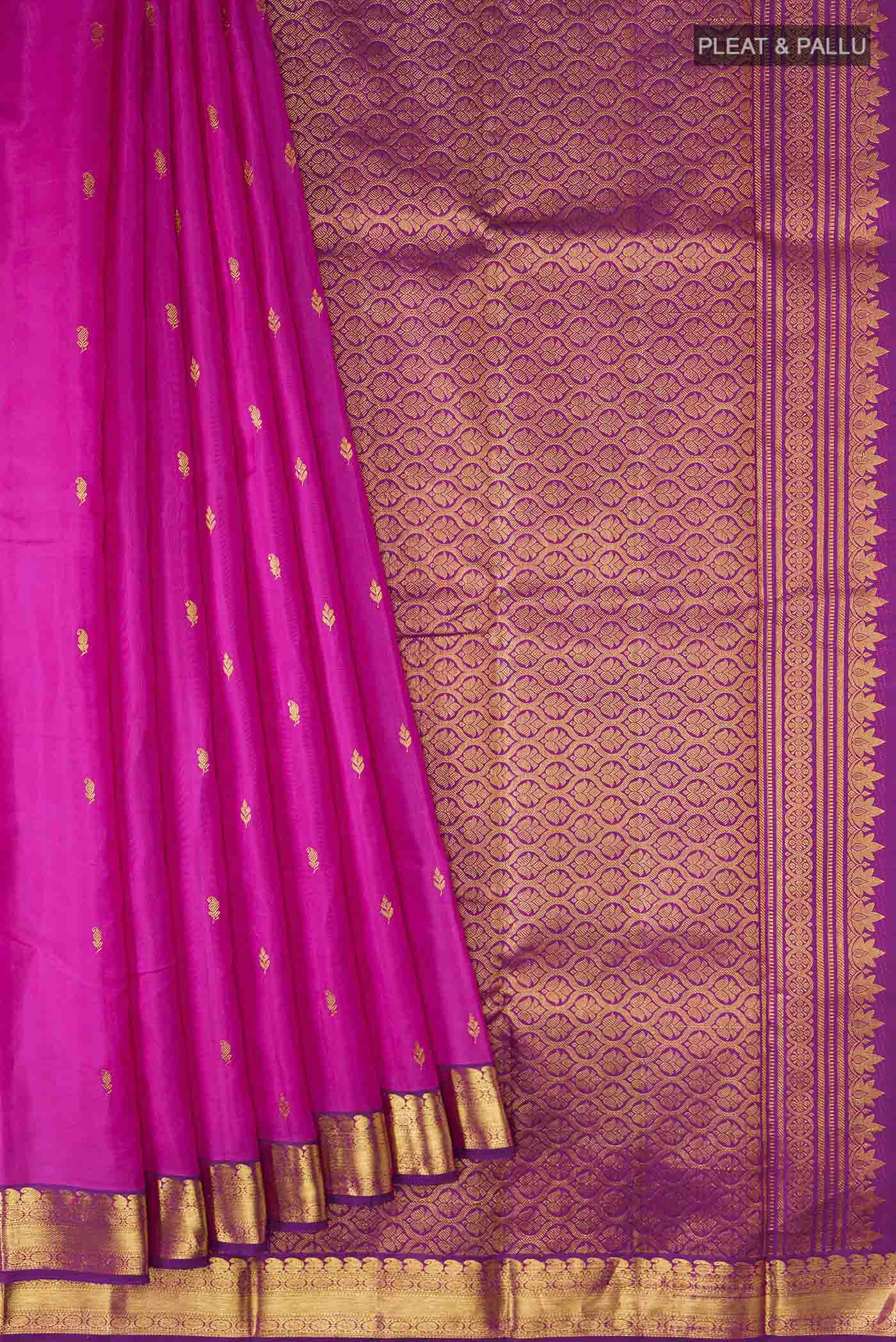 Pleats and pallu of Pink Kanchipuram Silk Saree with Zari Butta on the body and Zari Border