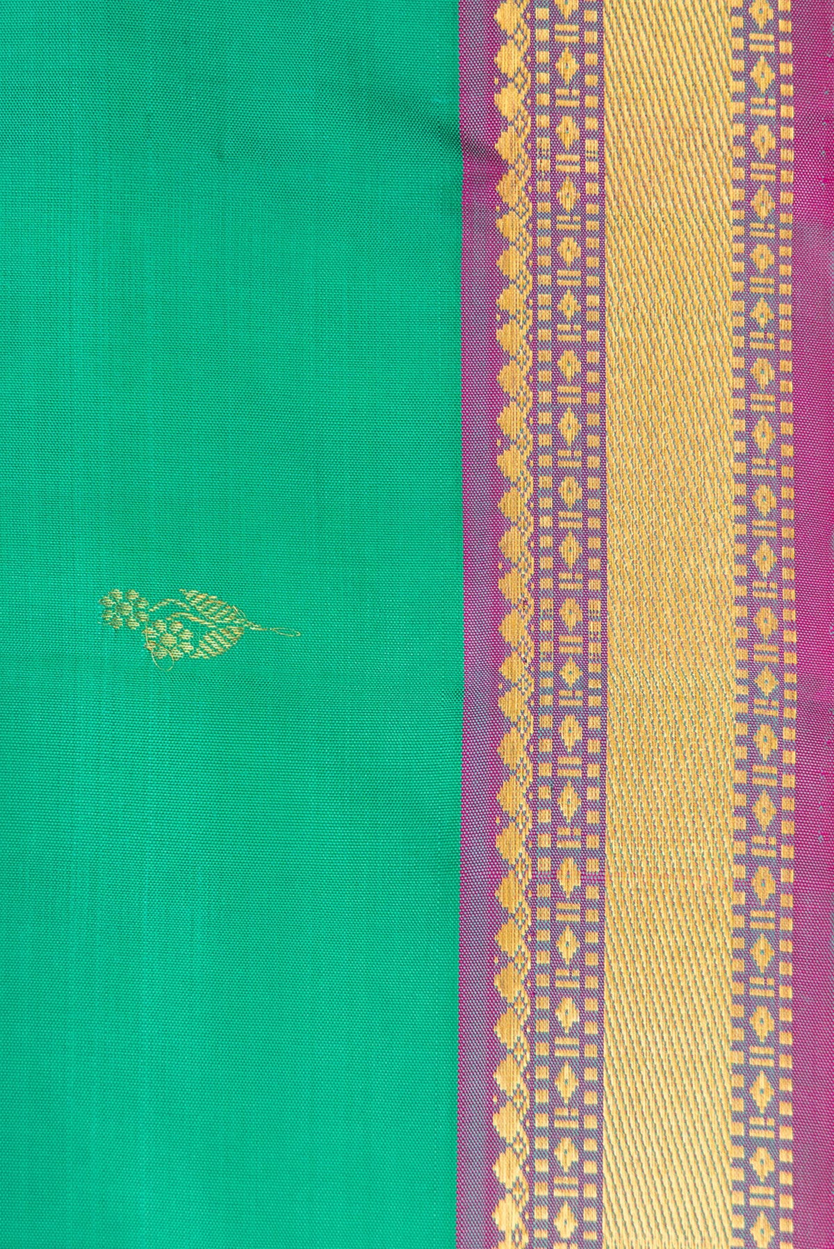 Border image of Green Dual Tone Kanchipuram Silk Saree with Zari Butta on the body and Zari Border. 